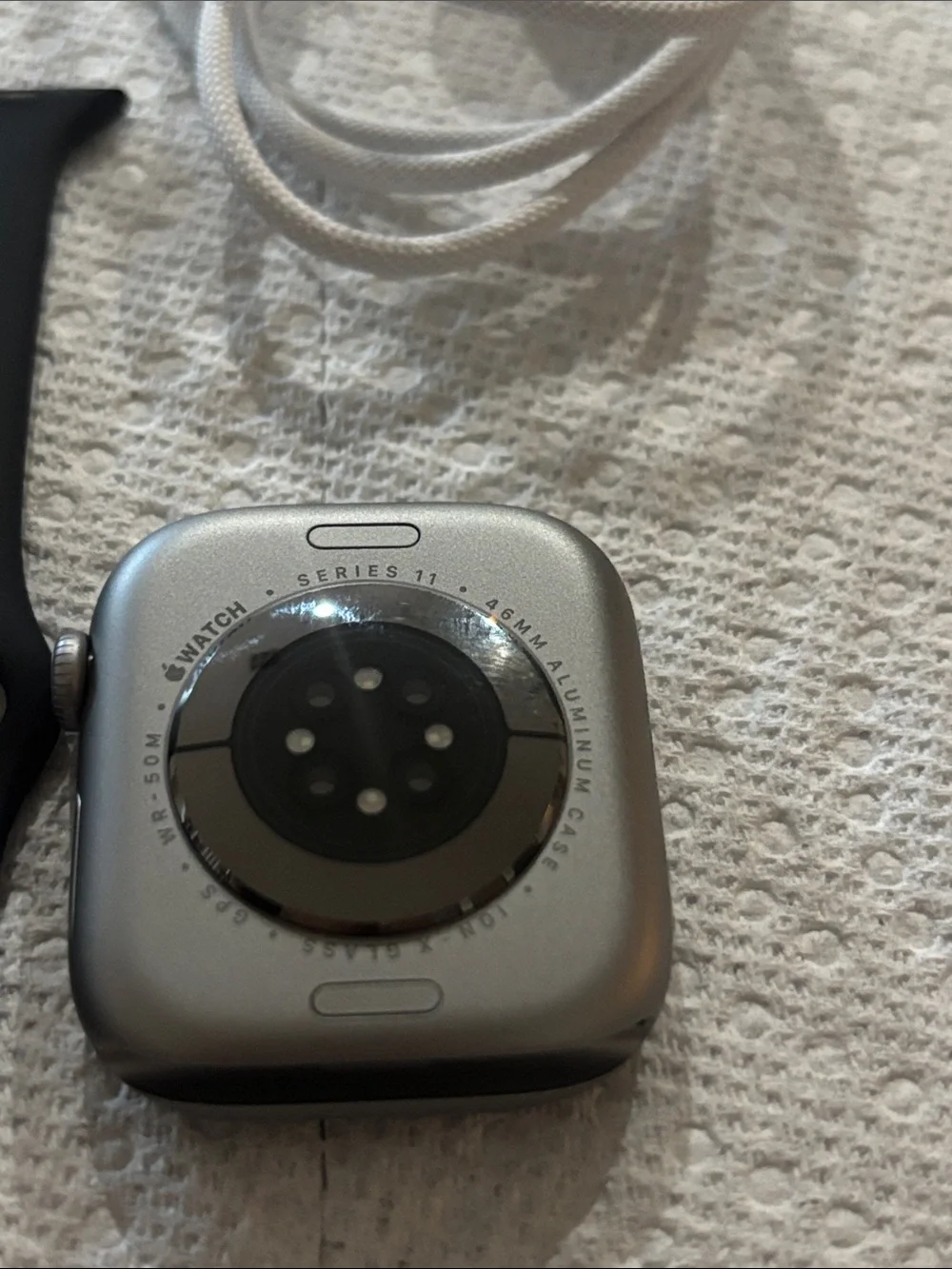 Apple Black and grey Smartwatch with Black Sport Band and White Charger Cable